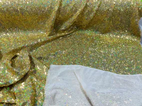 Gold Iridescent Mini Glitz Sequins on a 4 Way Stretch Mesh-Sold By The Yard.